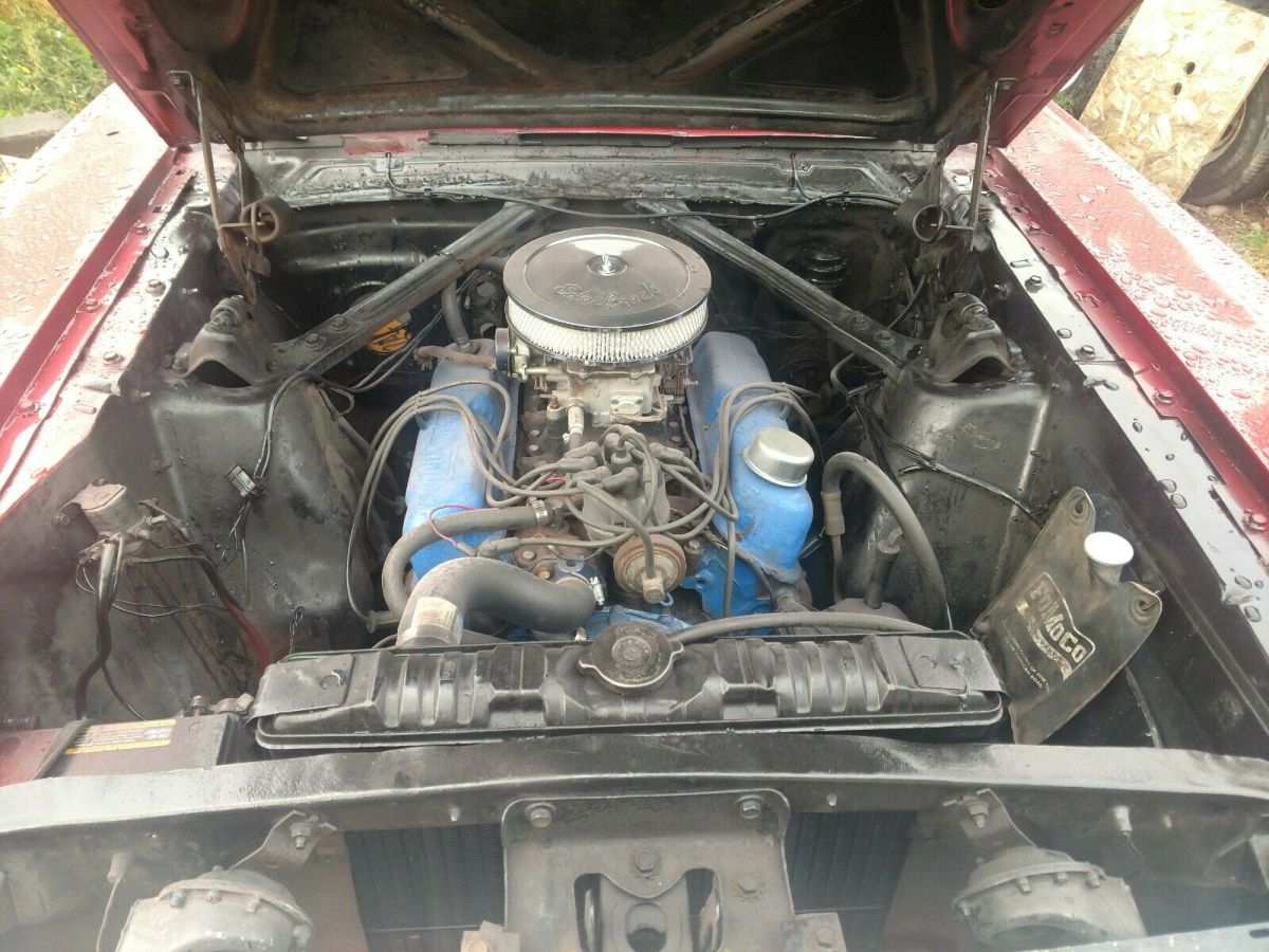 1965 Burgundy Ford Mustang Convertible