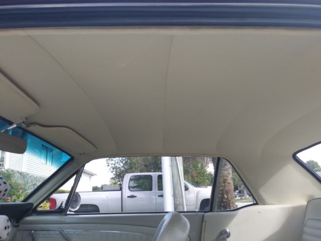 1965 Burgundy Ford Mustang Coupe