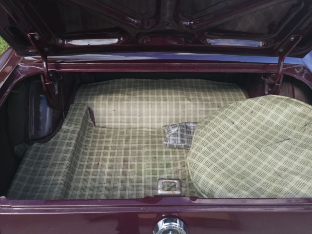 1965 Burgundy Ford Mustang Coupe