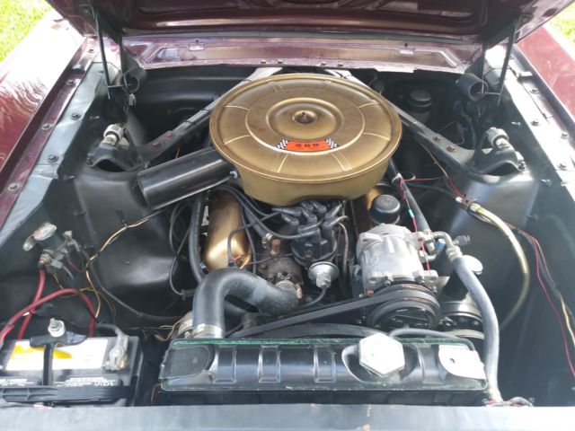 1965 Burgundy Ford Mustang Coupe