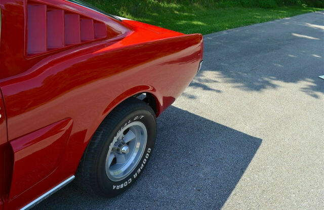 1965 bright red Ford Mustang