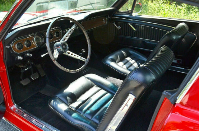 1965 bright red Ford Mustang