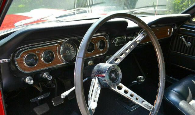 1965 bright red Ford Mustang