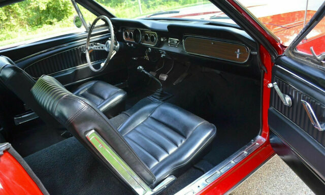 1965 bright red Ford Mustang