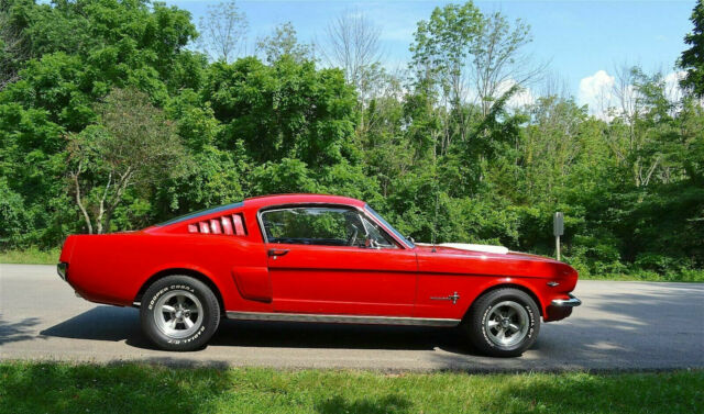 1965 bright red Ford Mustang