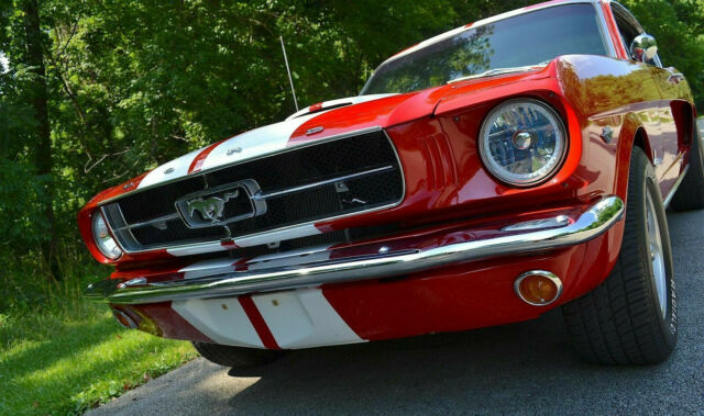 1965 bright red Ford Mustang