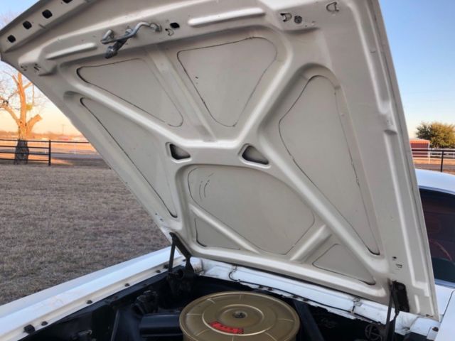 1965 White Ford Mustang