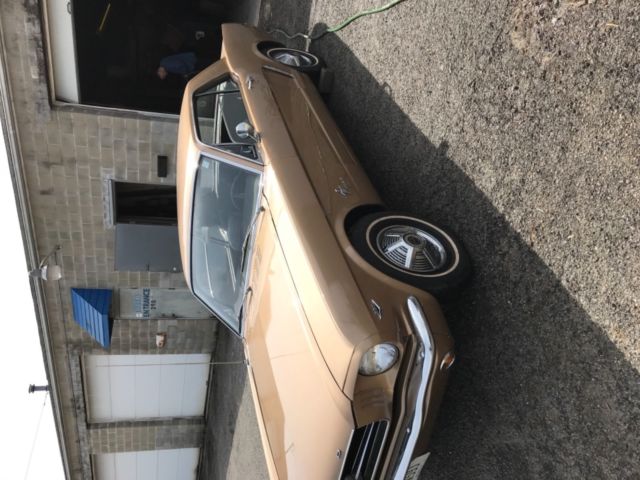 1965 Gold Ford Mustang Coupe