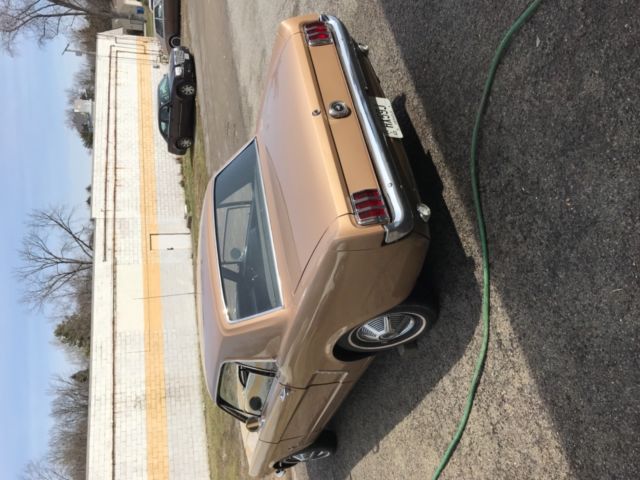 1965 Gold Ford Mustang Coupe