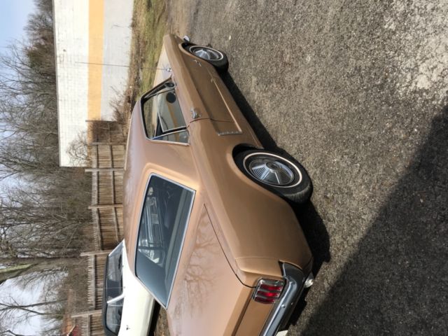 1965 Gold Ford Mustang Coupe