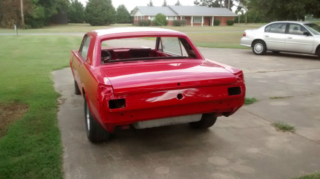 1965 Red Ford Mustang Coupe