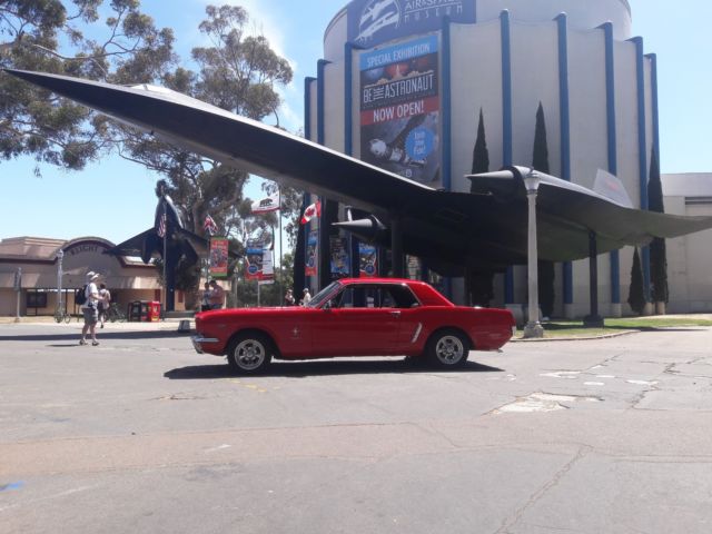 1965 red Ford Mustang