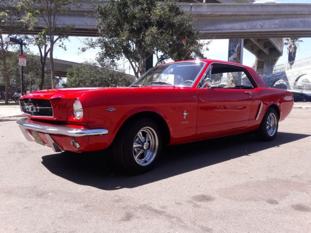 1965 red Ford Mustang