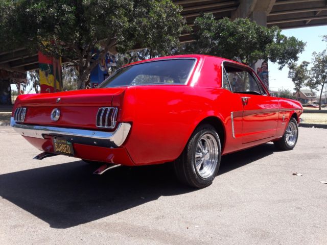 1965 red Ford Mustang