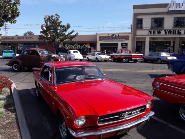 1965 red Ford Mustang