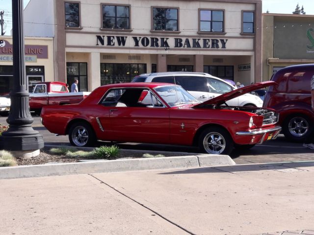 1965 red Ford Mustang