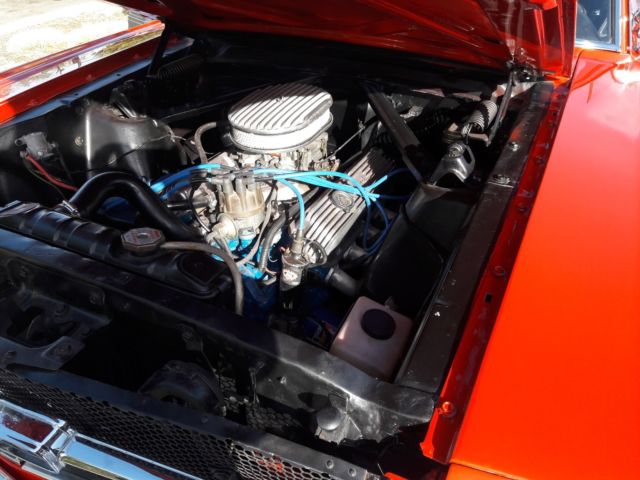 1965 red Ford Mustang