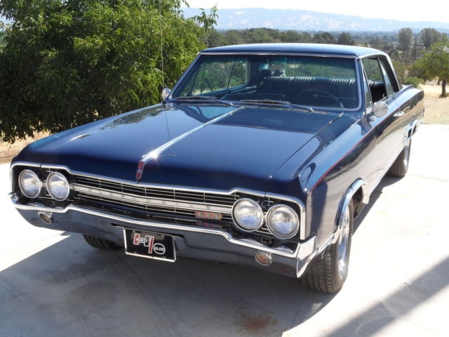 1965 dark blue Oldsmobile 442 Coupe