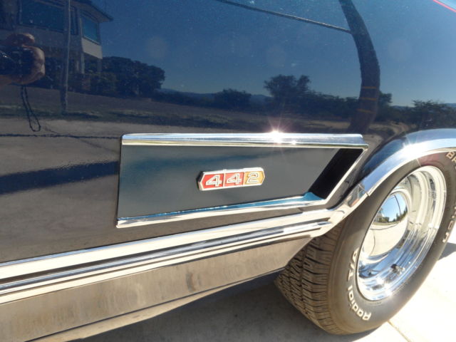 1965 dark blue Oldsmobile 442 Coupe