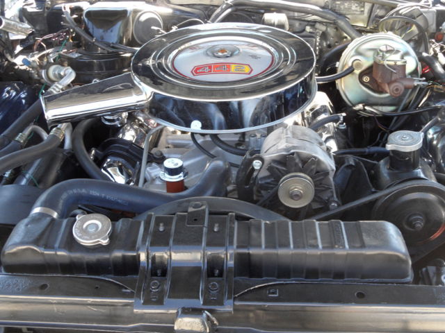 1965 dark blue Oldsmobile 442 Coupe