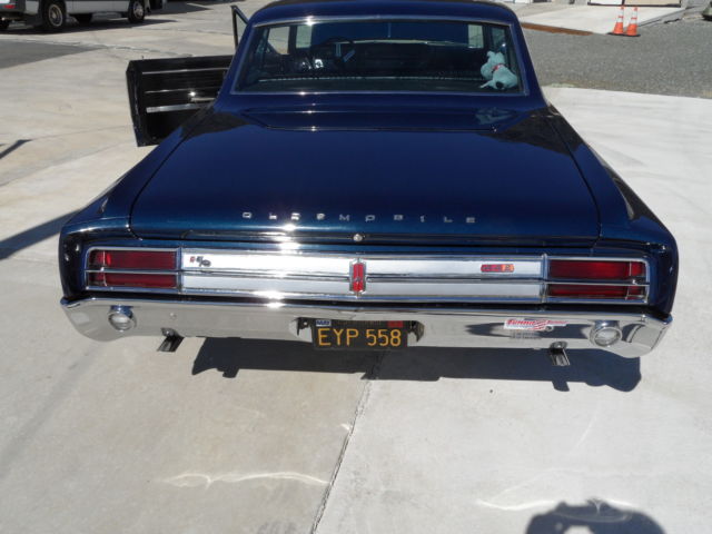 1965 dark blue Oldsmobile 442 Coupe