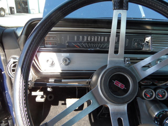 1965 dark blue Oldsmobile 442 Coupe