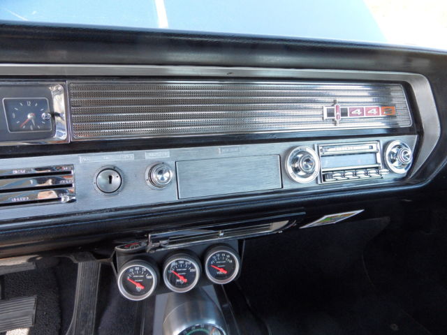 1965 dark blue Oldsmobile 442 Coupe