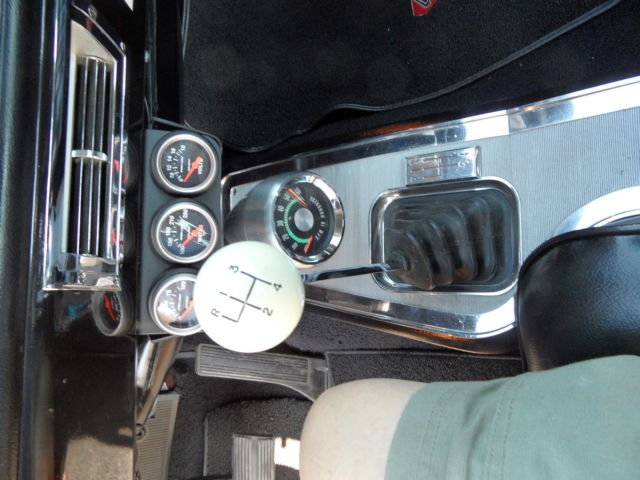 1965 dark blue Oldsmobile 442 Coupe