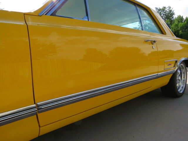 1965 Yellow Oldsmobile 442 Coupe