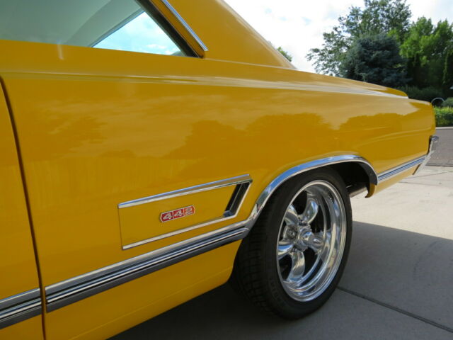 1965 Yellow Oldsmobile 442 Coupe