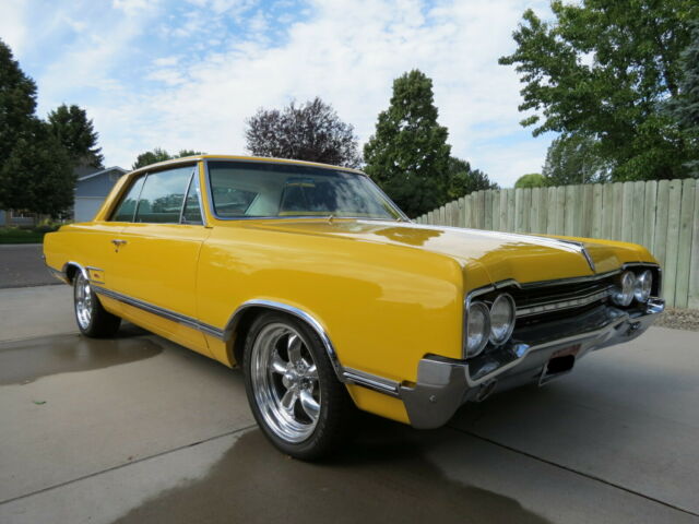 1965 Yellow Oldsmobile 442 Coupe