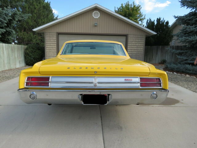 1965 Yellow Oldsmobile 442 Coupe