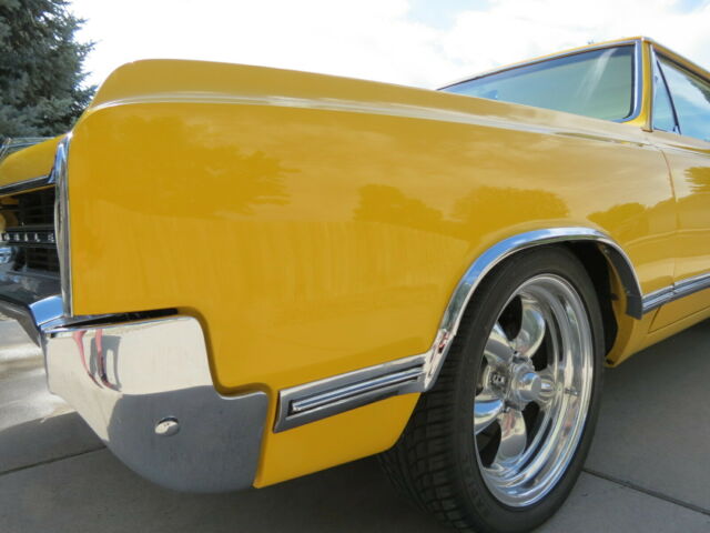 1965 Yellow Oldsmobile 442 Coupe