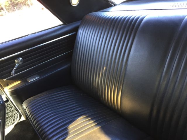 1965 White Oldsmobile Cutlass Coupe