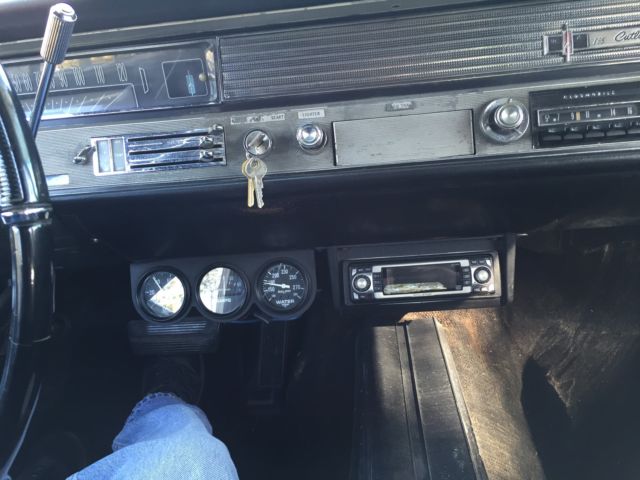 1965 White Oldsmobile Cutlass Coupe