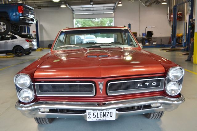 1965 Burgundy Pontiac GTO Coupe
