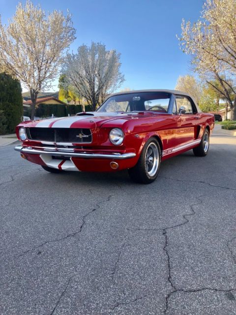 1965 Red with white stripes Ford Mustang Convertible