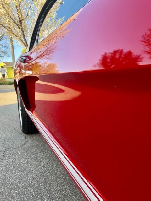 1965 Red with white stripes Ford Mustang Convertible