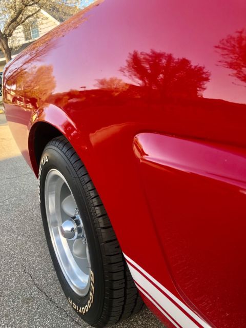 1965 Red with white stripes Ford Mustang Convertible