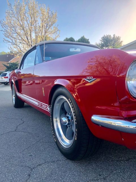 1965 Red with white stripes Ford Mustang Convertible