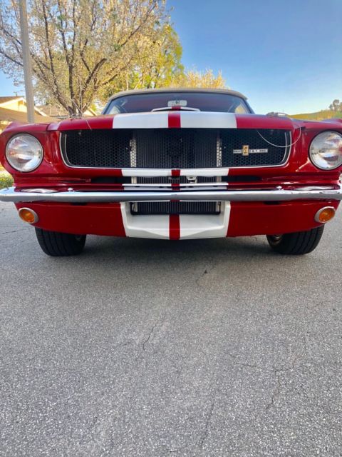 1965 Red with white stripes Ford Mustang Convertible