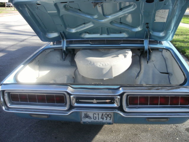 1965 light metalic blue Ford Thunderbird