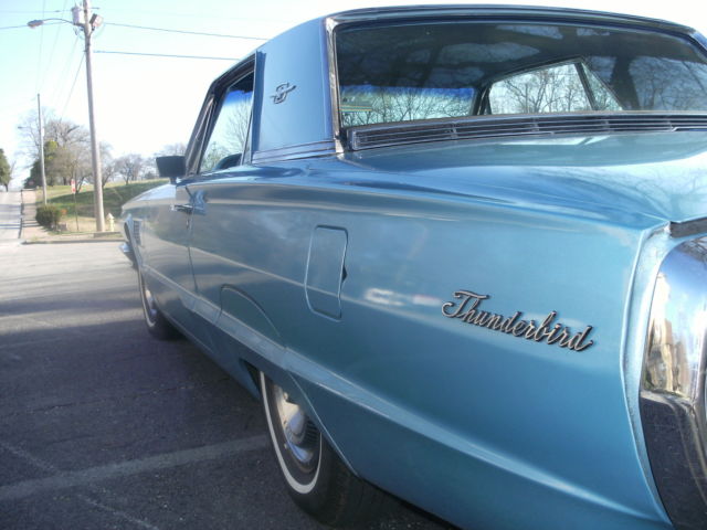 1965 light metalic blue Ford Thunderbird