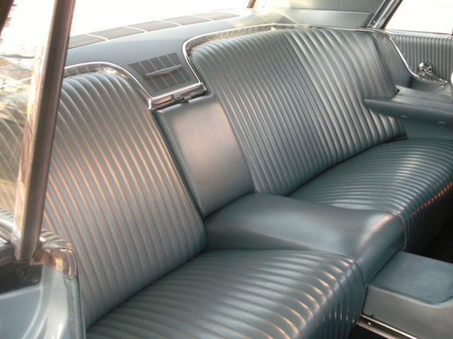 1965 light metalic blue Ford Thunderbird