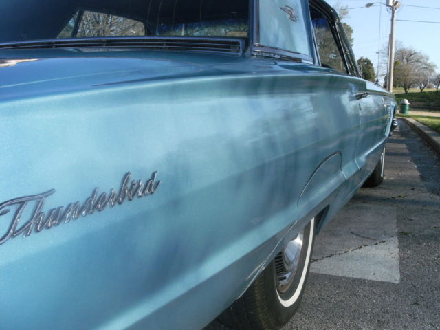 1965 light metalic blue Ford Thunderbird