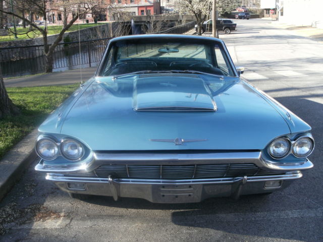 1965 light metalic blue Ford Thunderbird