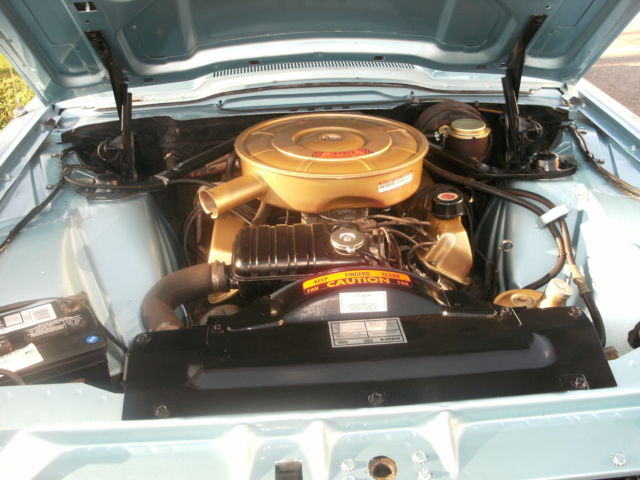 1965 light metalic blue Ford Thunderbird