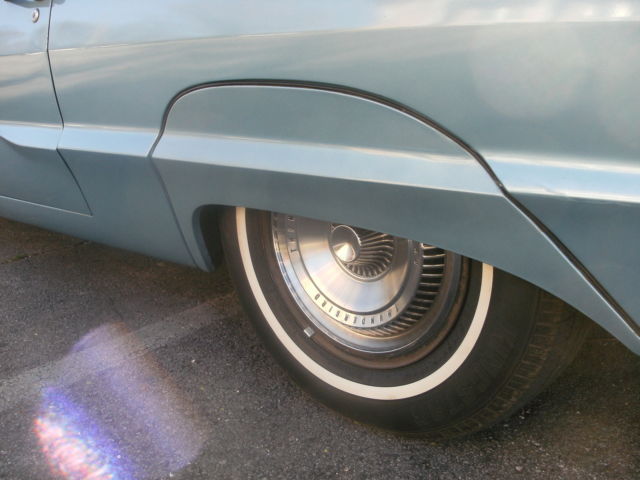 1965 light metalic blue Ford Thunderbird