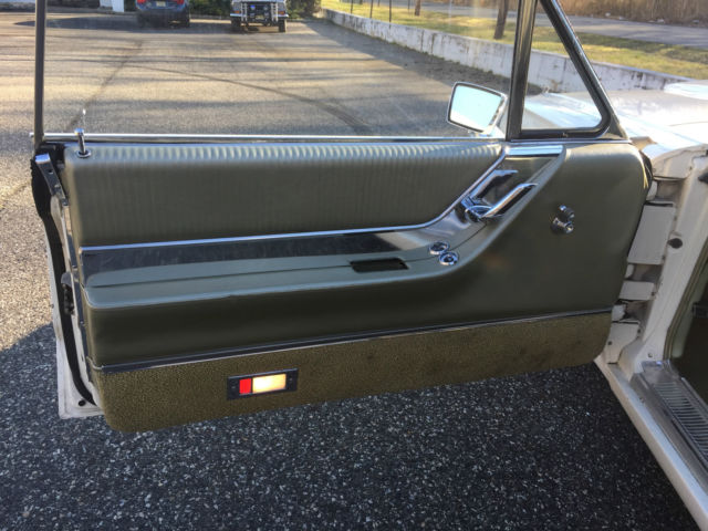 1965 White Ford Thunderbird Convertible