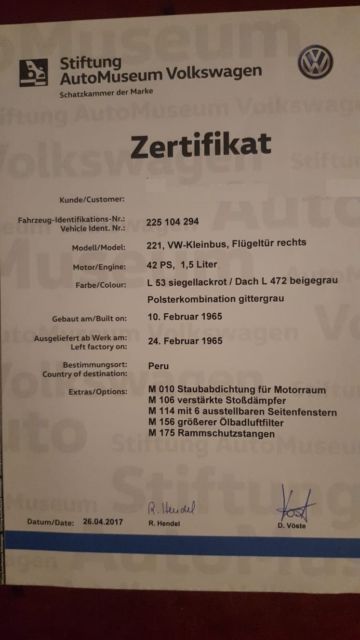 1965 red Volkswagen Beetle - Classic Minivan